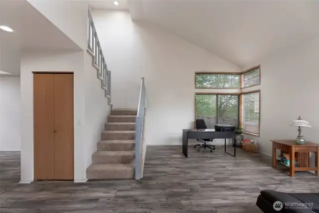 Living room and stairs to upper level