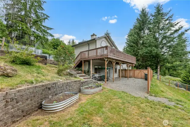 Fencing is 5 years old and fully fenced with open panel fencing to take in all the views but a curtesy fence near the home.  2 Drive through gates by deck and into lower pasture.  Great for pets.