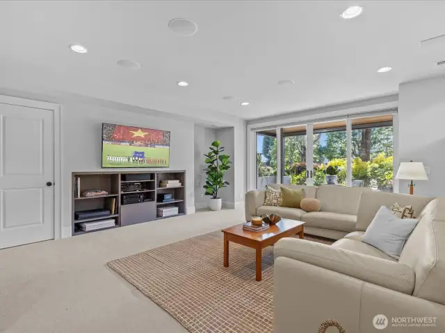 Enjoy a dedicated media room featuring a spacious layout—perfect for entertaining guests and cozy movie nights with family and friends.