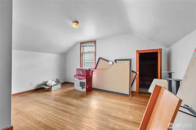 Upstairs bedroom with hardwoods