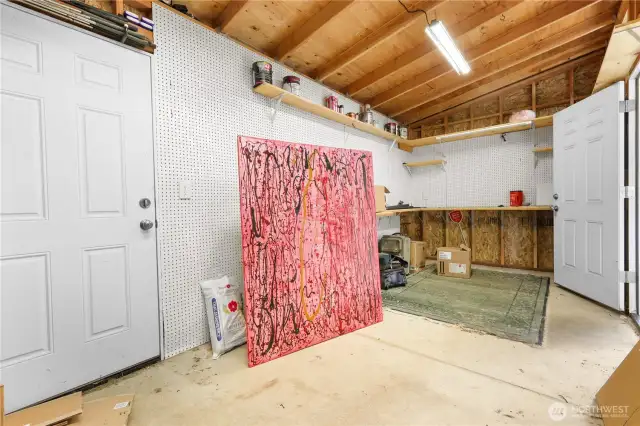 Newer storage shed /shop with power