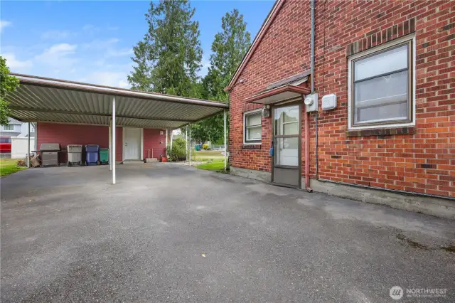 4 car covered parking plus storage /shop