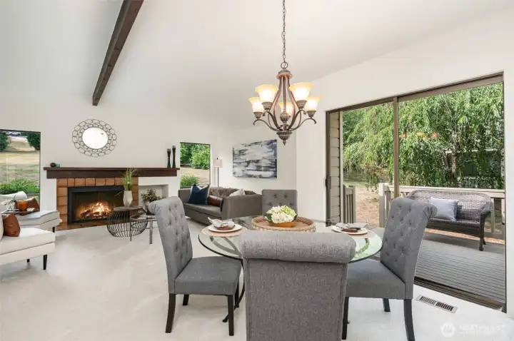 Dining area off kitchen with slider to spacious deck