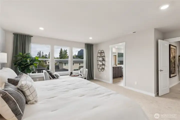 Huge primary suite can accommodate a King size mattress and more! Photo is representational. Actual home is under construction and finishes and paint colors may vary. See site agent for details.