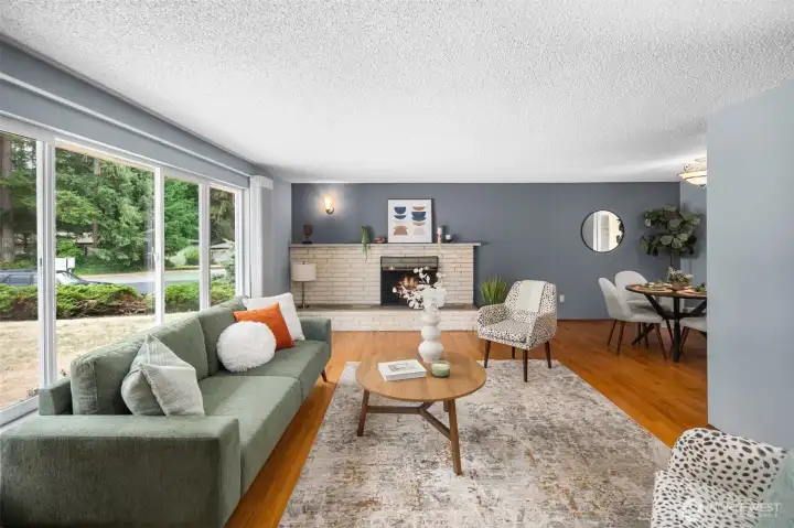 Expansive picture windows bring in tons of natural light. This home is fabulous for entertaining!