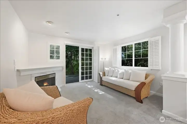 Living room featuring gas fireplace and sliding door to patio