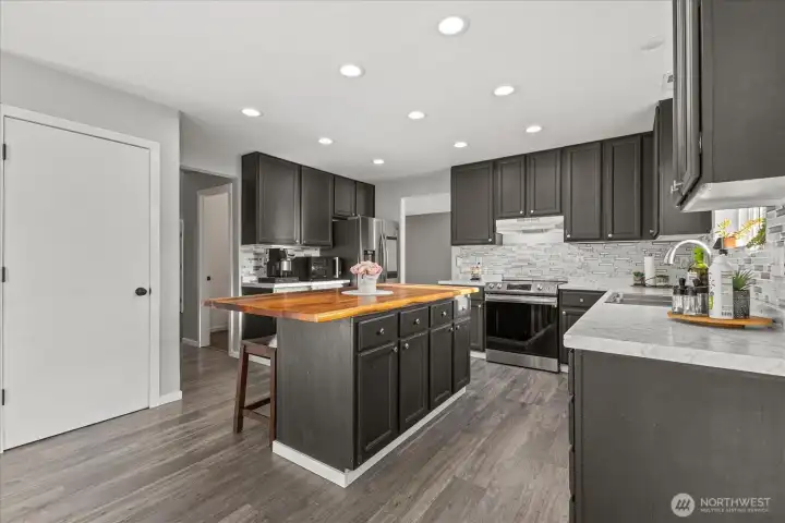 Pantry off the kitchen offers even more storage space to maximize the functionality of the kitchen.