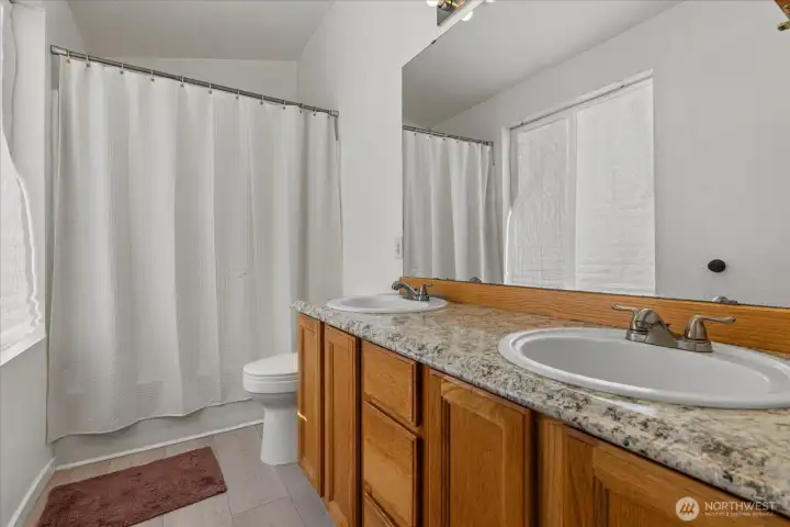 Primary Bathroom with Tub/Shower & Dual Vanity