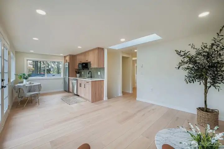 Upstairs kitchenette flows to main room.