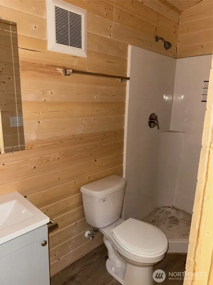 Bathroom with corner shower