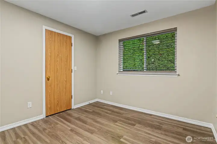 The door is the walk in closet for the first bed room.