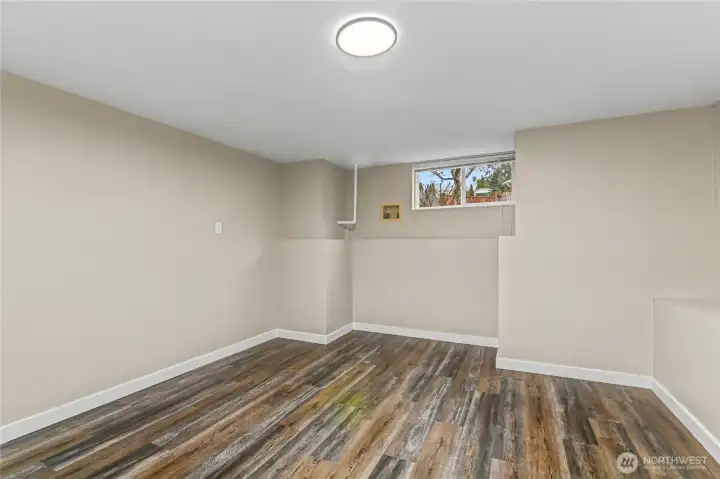 Downstairs bedroom. This room has no built in closet but does have a wardrobe.