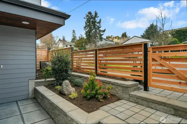 Featuring a fenced-in front yard,
