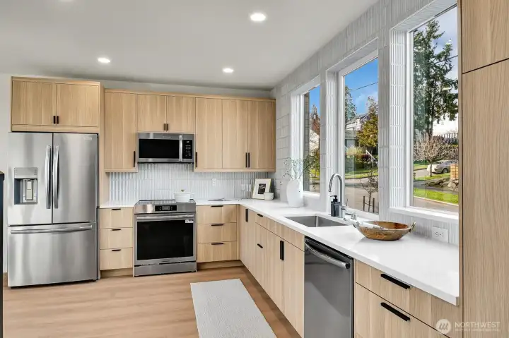 Tons of kitchen counter space and oversized windows