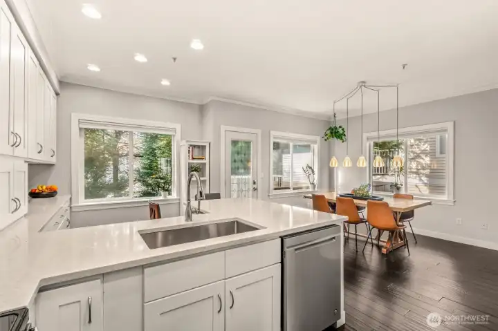 Entertain in this beautifully updated kitchen with adjacent dining room and deck