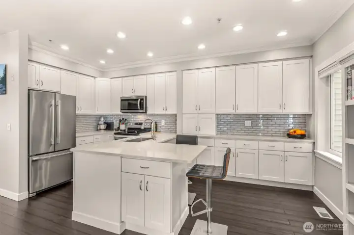 Gorgeous custom kitchen with custom storage.