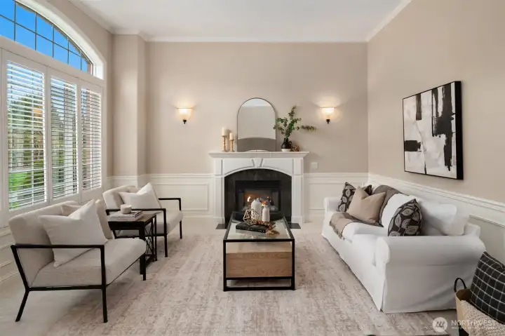 Cozy living room, gas fireplace + plantation shutters