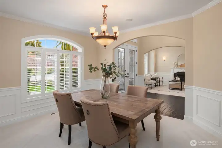 Formal dining room off entry + plantation shutters