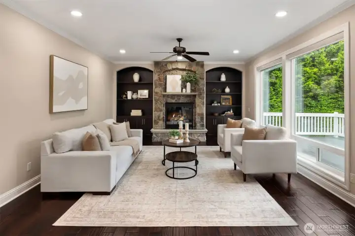 Light-filled family room off kitchen with gas fireplace