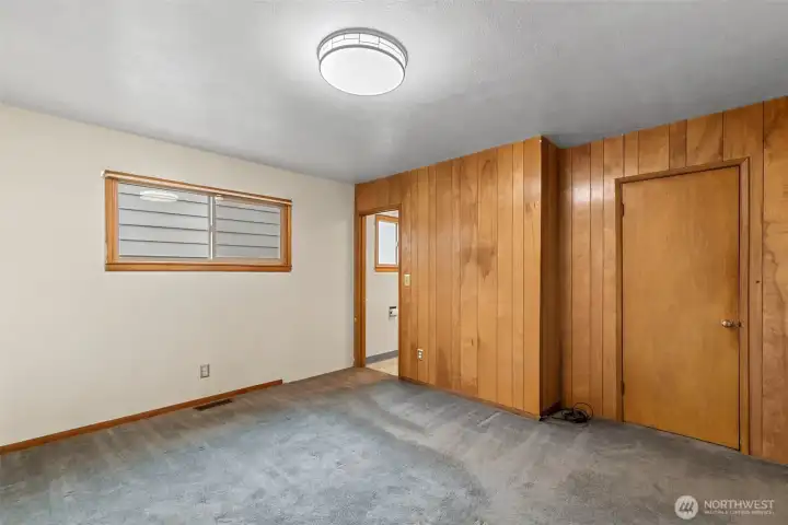 Primary bedroom leading to primary bath