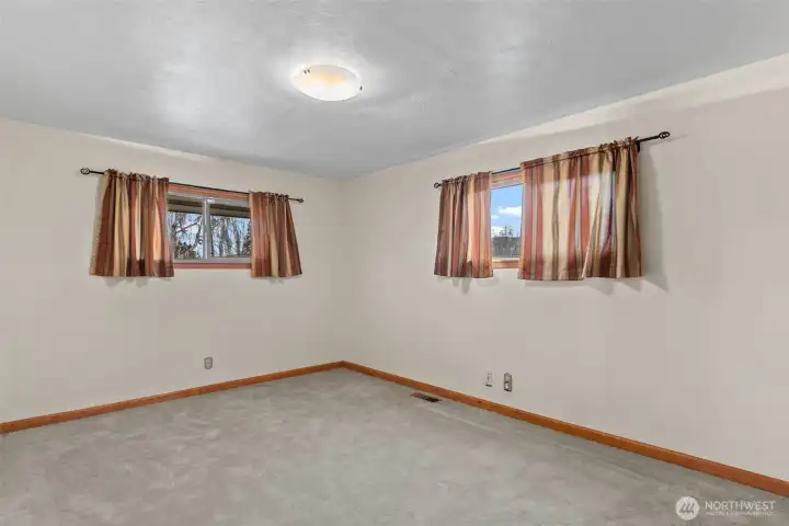 guest bedroom located on the main floor