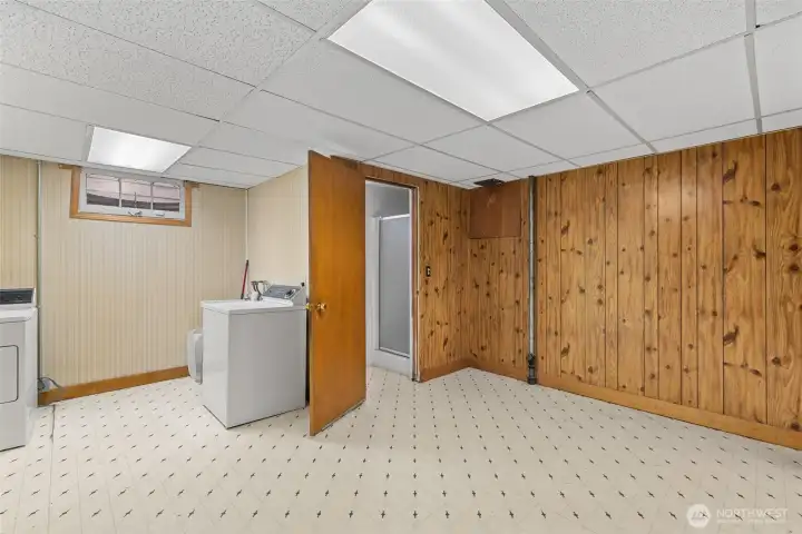 storage room and entry to 3 of 3 bathrooms.  This bathroom also includes a shower.