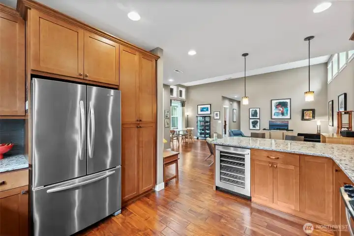 Gorgeous cabinetry provides abundant storage, and there's a wine fridge, too!