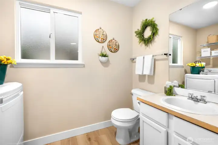Half bathroom and laundry room on main level