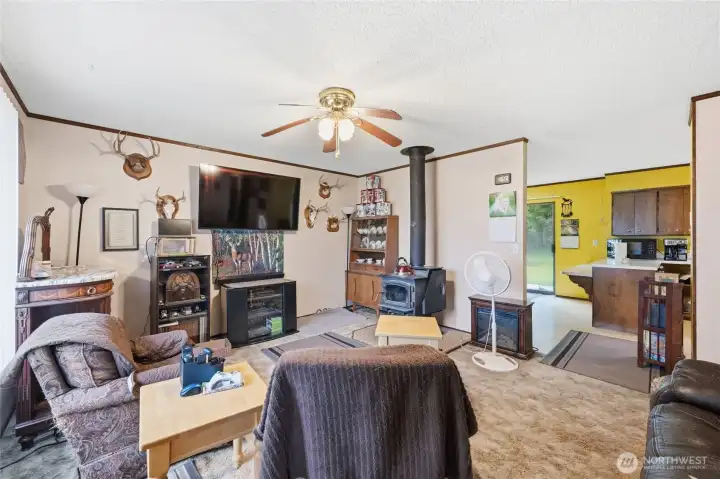 living room with wood stove