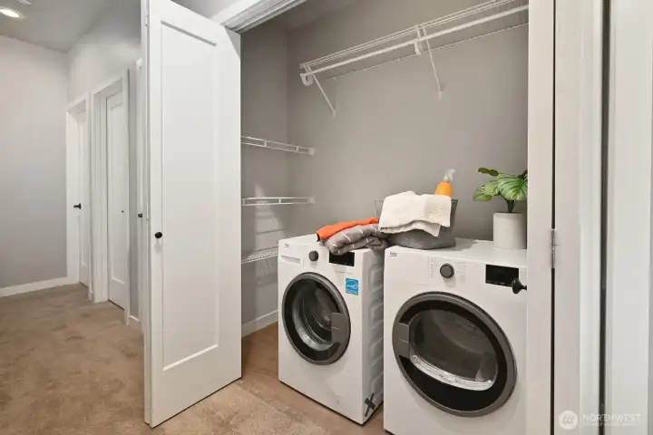 Laundry and additional storage on the upper level. Laundry and additional storage on the upper level.
