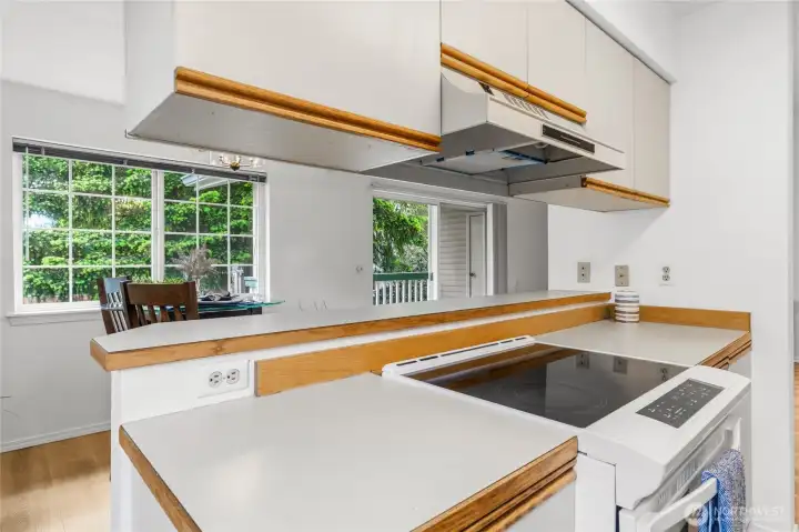 Open floor place flows into the dining and living room.