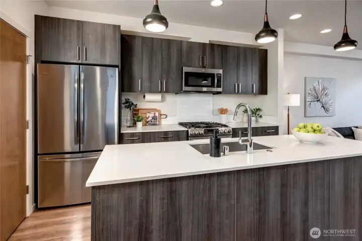 Spacious Kitchen Island with Ample Storage and Prep Space Spacious Kitchen Island with Ample Storage and Prep Space