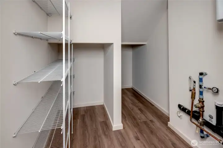 Spacious Walk In Pantry for Extra Storage and Organization. Tankless Water Heater Spacious Walk In Pantry for Extra Storage and Organization. Tankless Water Heater