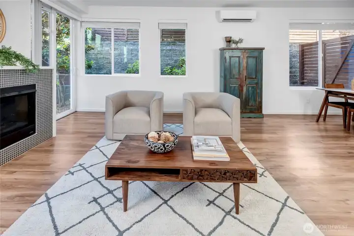 Spacious Living Area with Large Windows and Mini Split Heating and Cooling Spacious Living Area with Large Windows and Mini Split Heating and Cooling