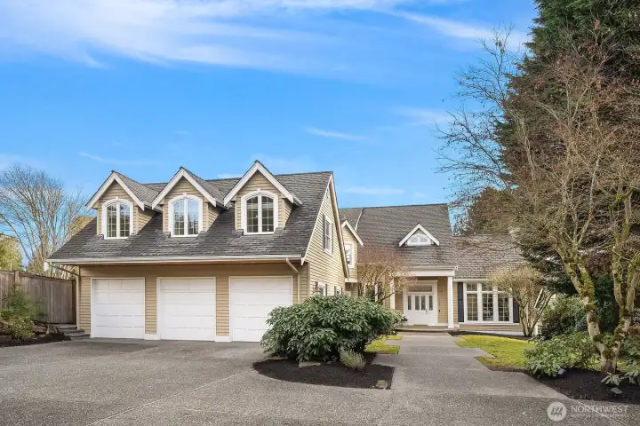 Tucked within a private enclave, this stunning custom home impresses with classic architectural charm, a spacious three-car garage, and beautifully maintained landscaping, a gracious and welcoming arrival experience from the moment you pull up. Tucked within a private enclave, this stunning custom home impresses with classic architectural charm, a spacious three-car garage, and beautifully maintained landscaping, a gracious and welcoming arrival experience from the moment you pull up.