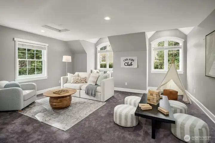 The elegant formal living room impresses with soaring ceilings, arched architectural details, and an abundance of natural light streaming through multiple windows. Neutral tones and generous proportions create a sophisticated yet welcoming space perfect for entertaining. The elegant formal living room impresses with soaring ceilings, arched architectural details, and an abundance of natural light streaming through multiple windows. Neutral tones and generous proportions create a sophisticated yet welcoming space perfect for entertaining.