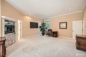 Primary Suite with marble surround double-sided fireplace