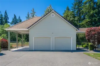 2-car garage with covered carport