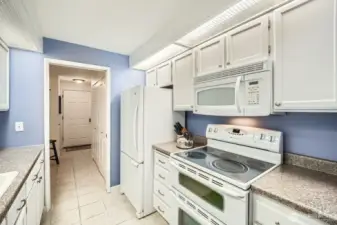 Spacious kitchen with lots of counterspace and storage.