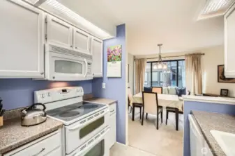 Kitchen adjoins dining room.