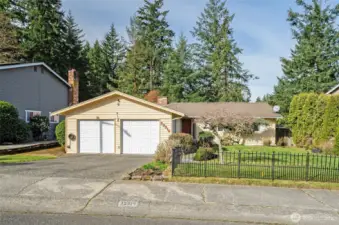 Beautiful rambler in the desirable Woodbridge community, backing directly to Olympic View Park and its trail system.