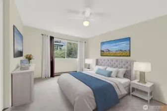 Primary bedroom shown virtually staged