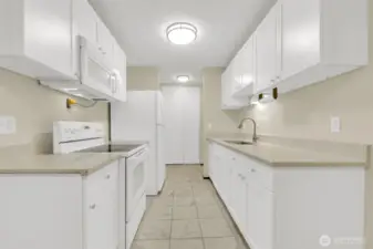 New white cabinets and quartz countertops
