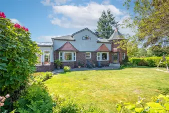 15,135+ sq ft corner lot; fully fenced with a  sprinkler system -