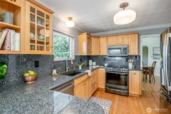 This lovely kitchen has great flow and a gas range!