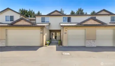 Low-maintenance 2 bed 2.5 bath townhouse with an attached garage that leads straight into your home!