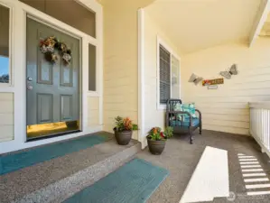 Can't you see yourself here? This neighborhood is great for walking, and not on a main road, so this covered porch is great spot for sweet tea & greeting the neighbors!