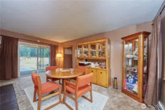 Enjoy peaceful pasture views from the dining room, with easy access to bonus rooms and the garage.