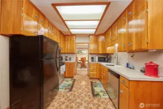 Enjoy plenty of kitchen storage paired with an open, welcoming space perfect for cooking and gathering. Easy access to both dining areas.