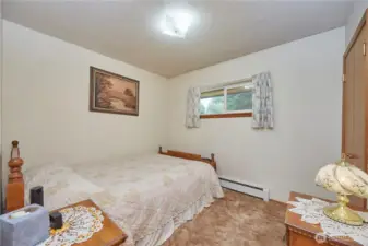 Guest bedroom 1 offers comfortable accommodations for visitors.